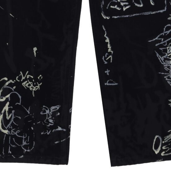 Balenciaga graffiti denim trousers