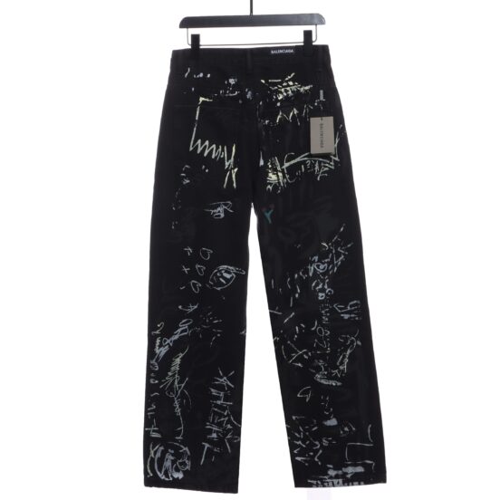 Balenciaga graffiti denim trousers